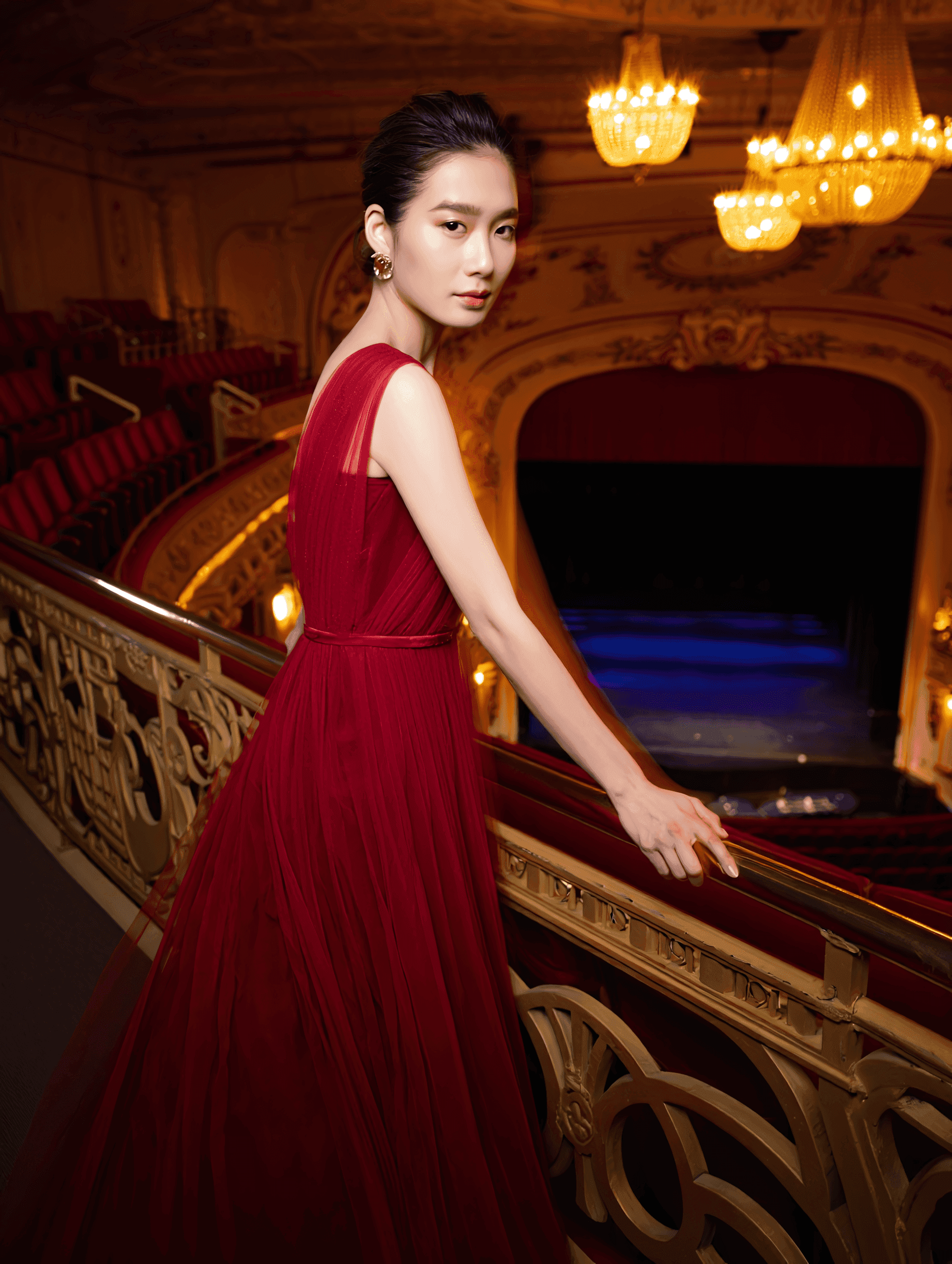 A guest on the balcony of a grand theatre